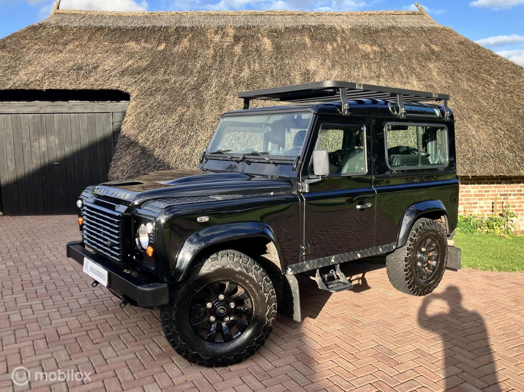 Land Rover Defender 2.4 TD 90 SW S, Auto's, Land Rover, Stof, Gebruikt, Zwart, 4 cilinders