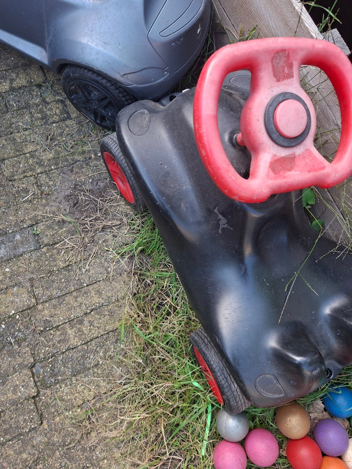 Zwarte loopauto met rood stuur, Ophalen of Verzenden, Gebruikt, Loopvoertuig