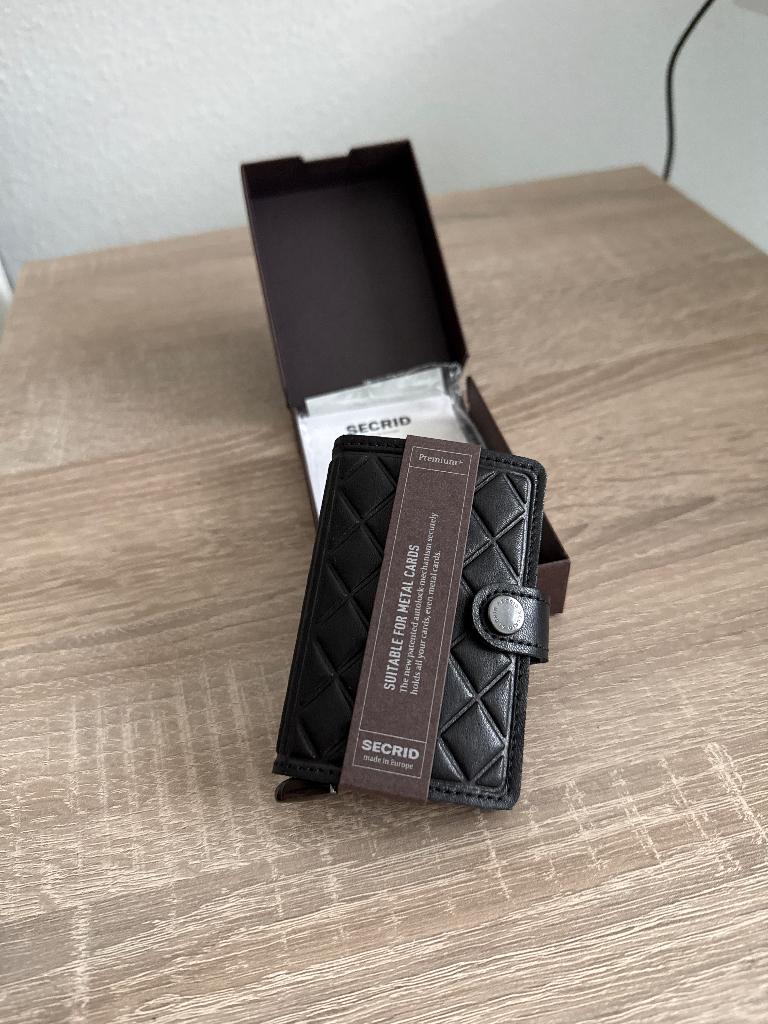 Secrid premium, Sieraden, Tassen en Uiterlijk, Portemonnees, Ophalen of Verzenden, Nieuw, Zwart