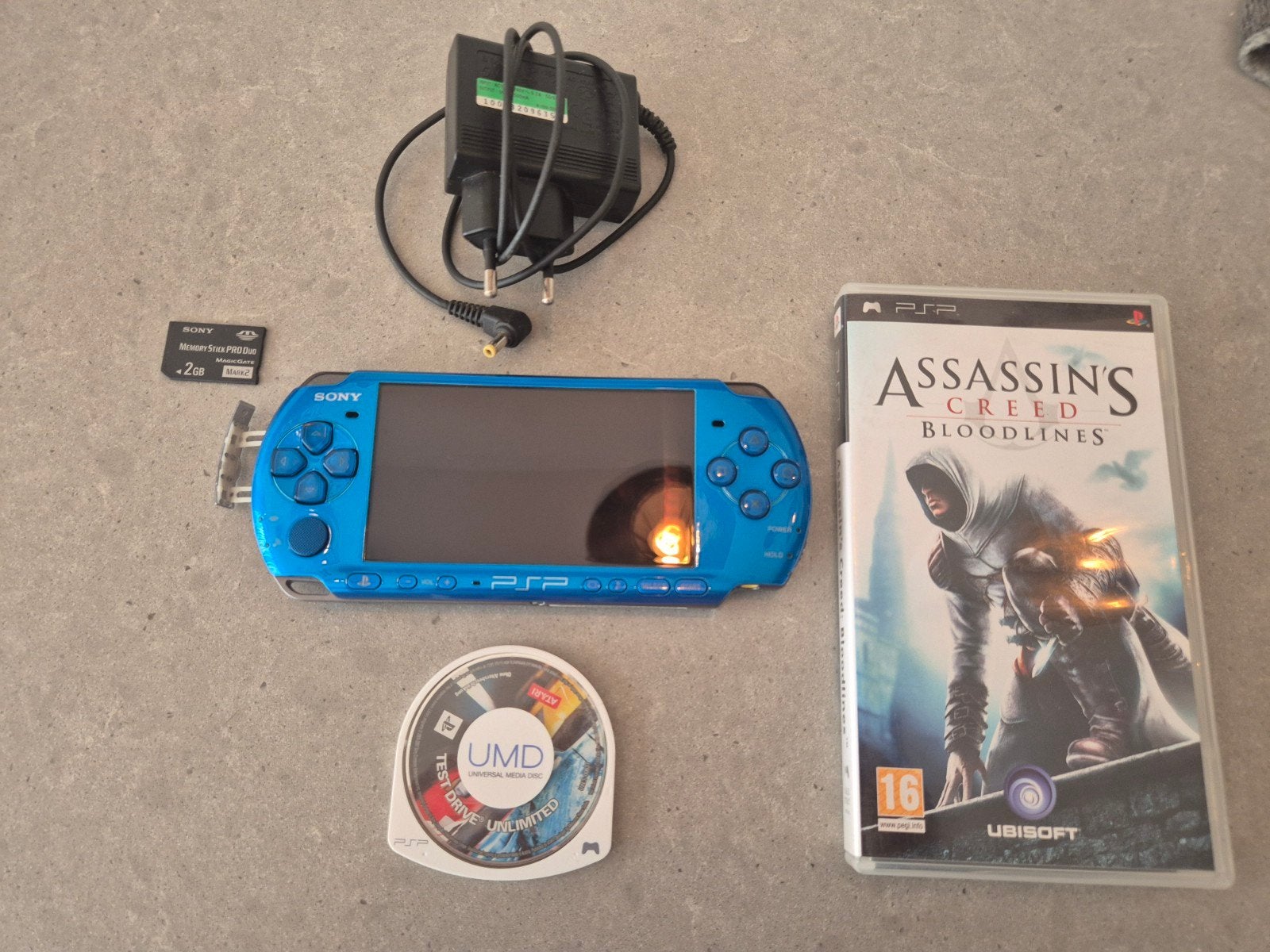 Blauwe PSP 3000 (als nieuw) met games en accessoires, Met games, Blauw, PSP 3000, Ophalen of Verzenden