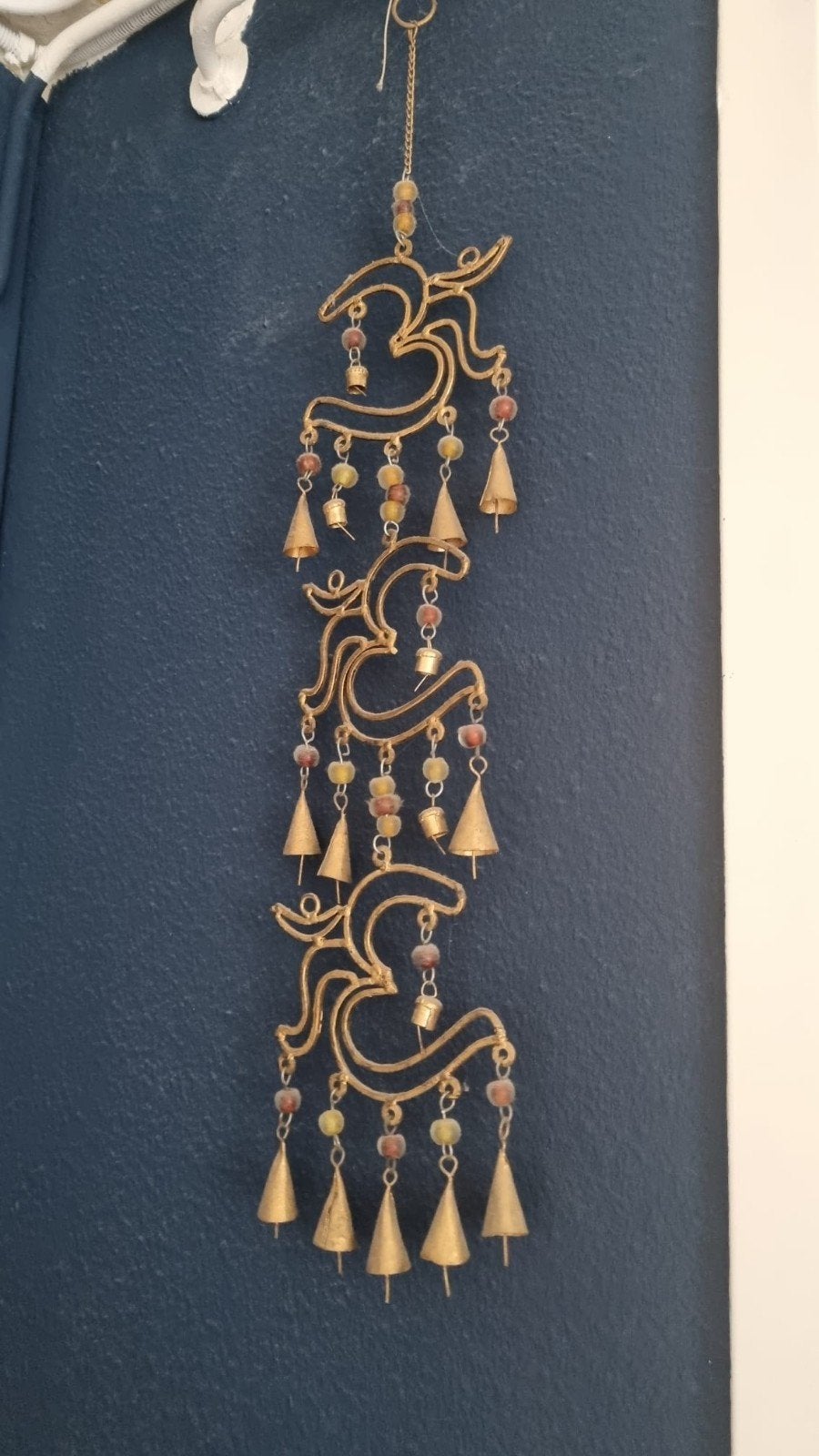 Twee Hamsa Hangers, Ophalen
