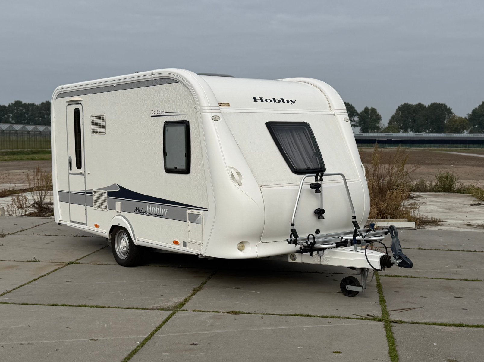 Hobby de luxe 400 SFE 2012 mover / voortent, Hobby, Frans bed, Treinzit, 750 - 1000 kg