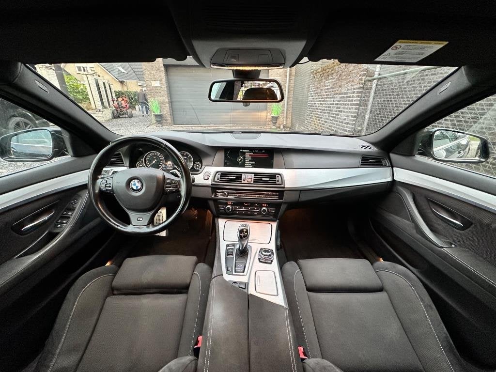Foto 8 van BMW 5-serie Touring 520i High Executive netteauto/keurigonde
