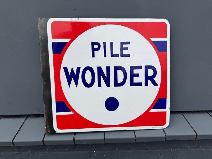 Vintage Emaille Reclamebord 'Pile Wonder', Antiek en Kunst, Ophalen of Verzenden