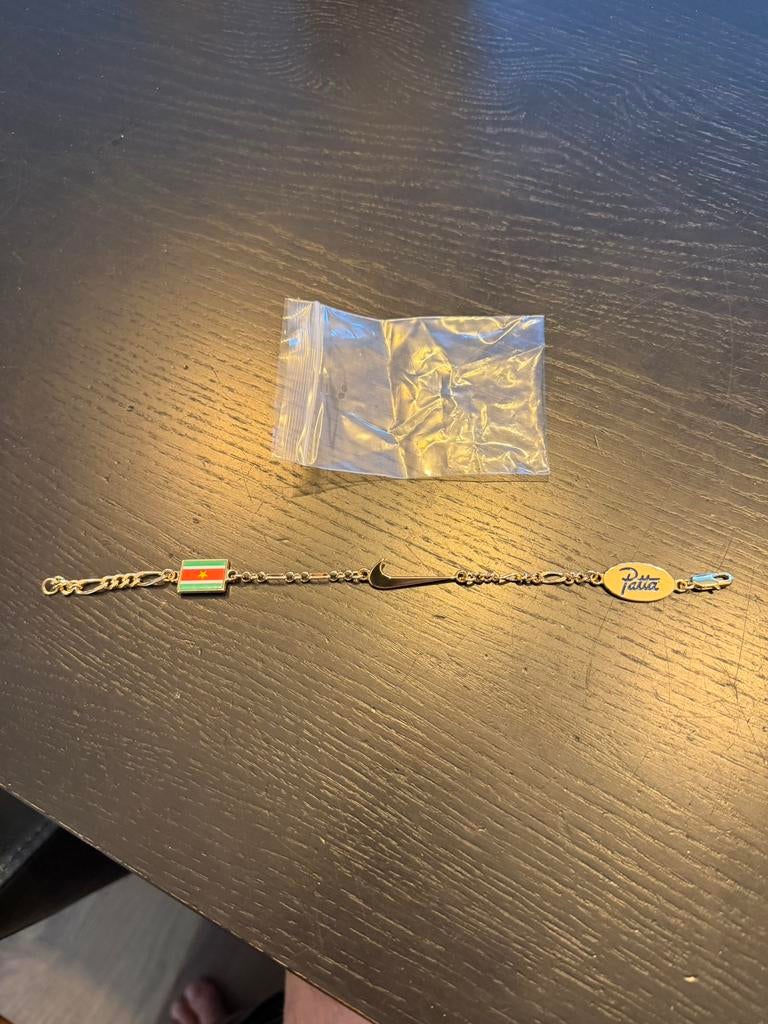 Nike air Max Patta Armband Bracelet Suriname Goud, Sieraden, Tassen en Uiterlijk, Ophalen of Verzenden, Zo goed als nieuw, Goud