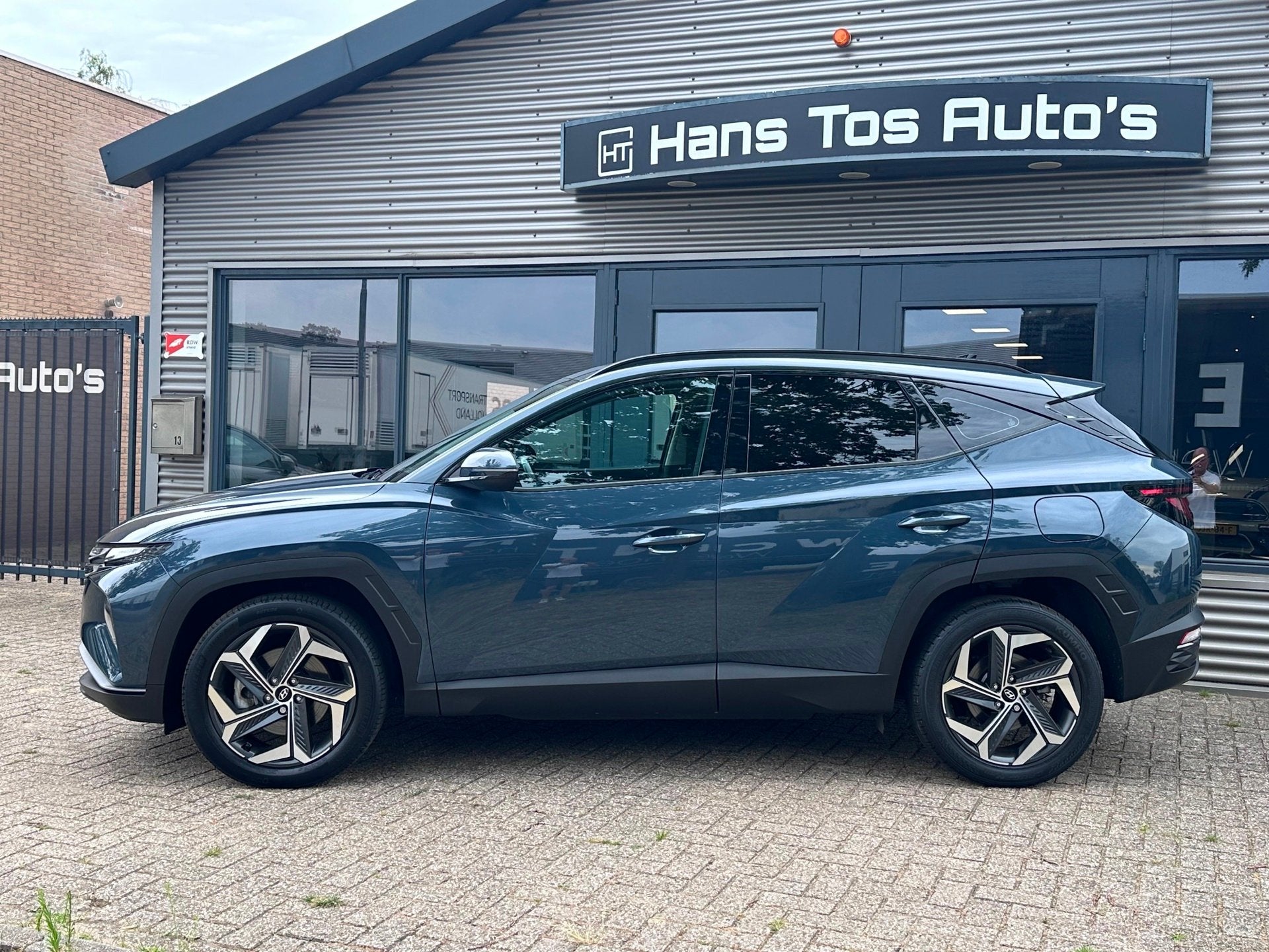 Hyundai TUCSON 1.6 T-GDI PHEV 265pk 4WD ADAPT. CRUISE / CAME, Auto's, Automaat, Stof, Gebruikt, 4 cilinders