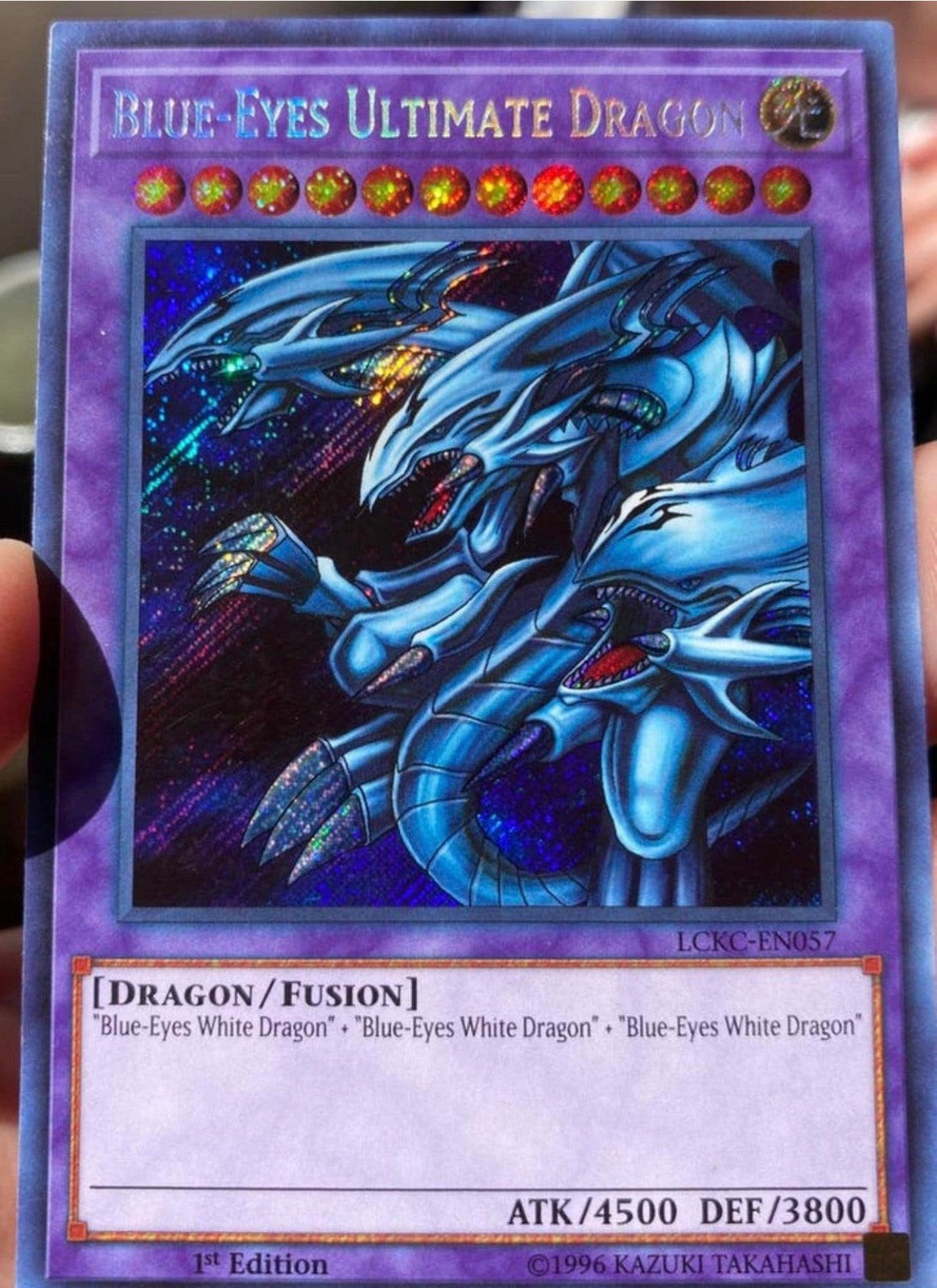 Yu-Gi-Oh! Blue-Eyes Ultimate Dragon LCKC 1st Edition !, Hobby en Vrije tijd, Ophalen of Verzenden, Zo goed als nieuw, Losse kaart