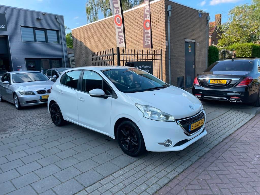 Peugeot 208 1.2 VTi Envy 1e Eigenaar! Airco Navi PDC NAP APK, Voorwielaandrijving, Euro 5, Gebruikt, 31 €/maand