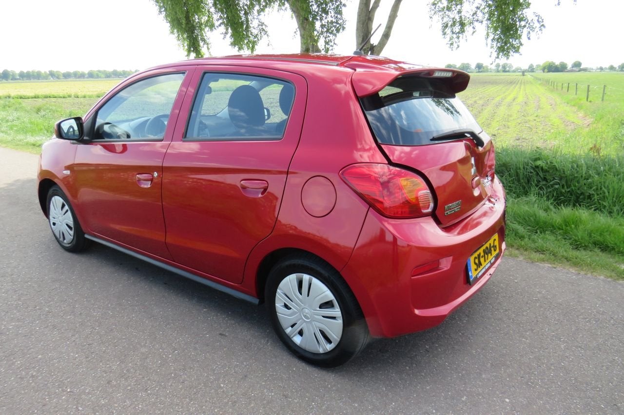 Mitsubishi Space Star 1.0 70pk 5drs Cool + 35.000km nap Airc, Handgeschakeld, Mitsubishi, Benzine, Rood