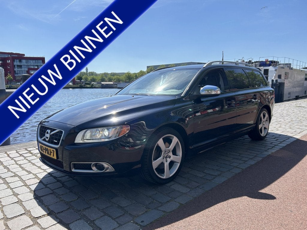 Volvo V70 2.0T R-Edition airco/ecc leer navigatie apk, Euro 5, Zwart, 4 cilinders, Automatische klimaatregeling