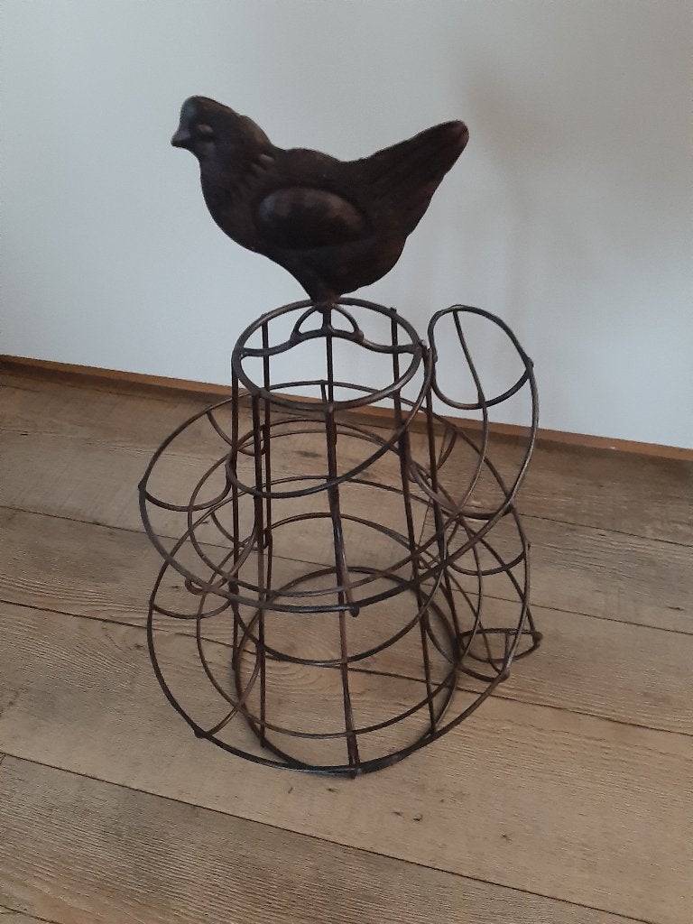 aparte metalen eier mand, Ophalen