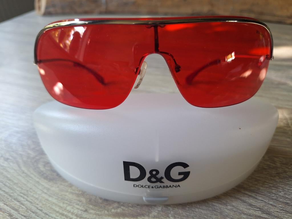 D&G Dolce&Gabanna Rolling zonnebril., Ophalen of Verzenden, Zo goed als nieuw, Rood, Overige merken