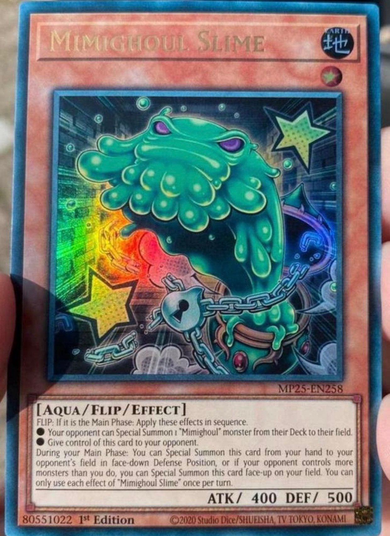 Yu-Gi-Oh! Mimighoul Slime MP25 1st Edition Tin Promo !, Ophalen of Verzenden, Zo goed als nieuw, Losse kaart, Foil