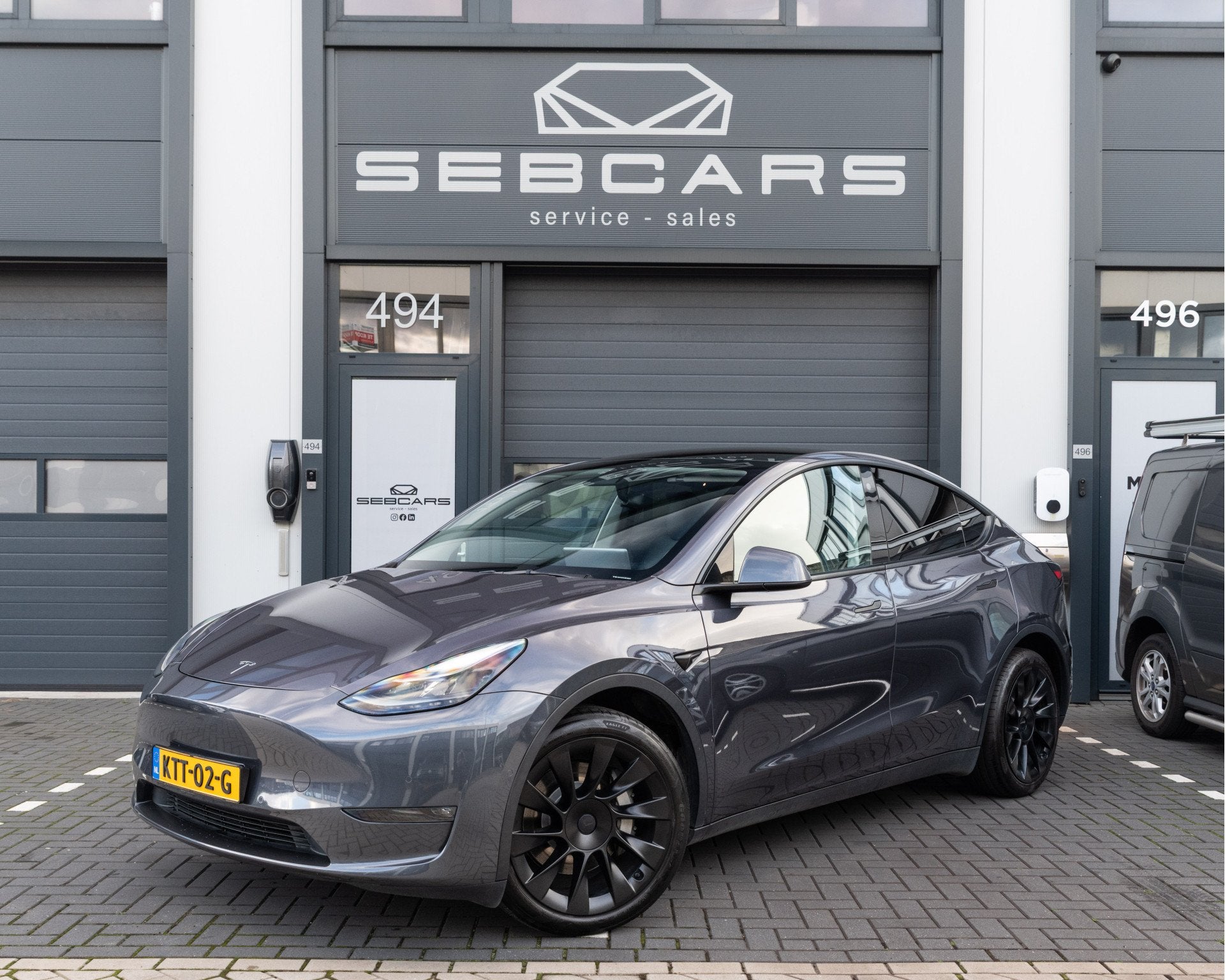 Tesla Model Y Long Range Dual Motor AWD 75 kWh 20INCH, PANOD, Auto's, Automaat, Gebruikt, Zwart, Met garantie (alle)