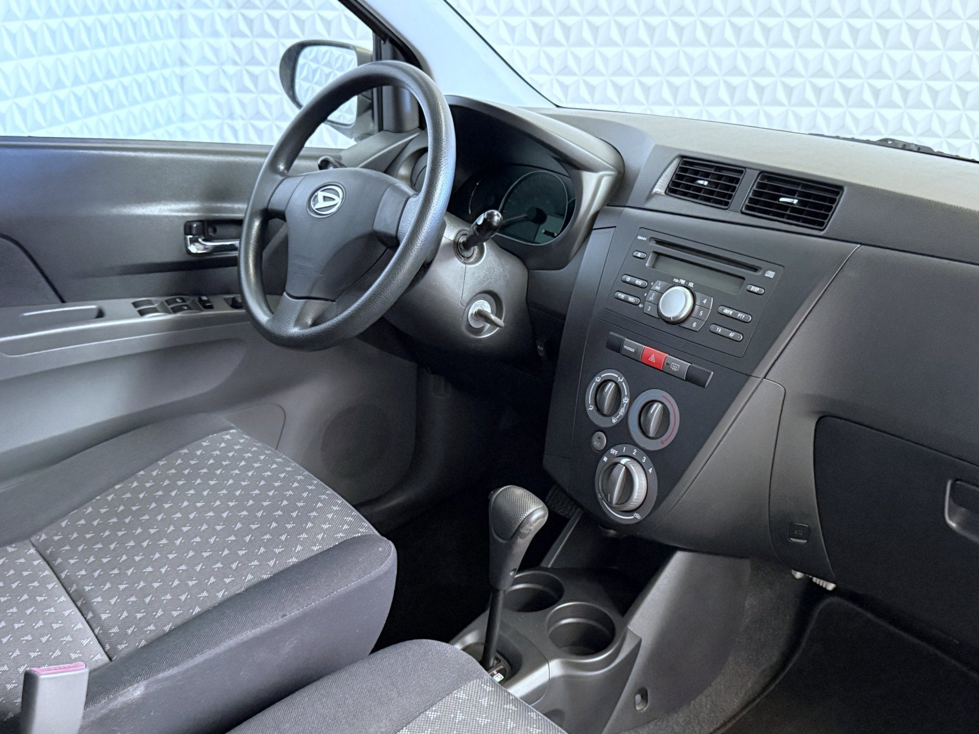 Daihatsu Cuore 1.0 Comfort Airco AUTOMAAT / 87.000km (2010), Auto's, Daihatsu, 18 €/maand, 4 stoelen, Cuore, Bedrijf