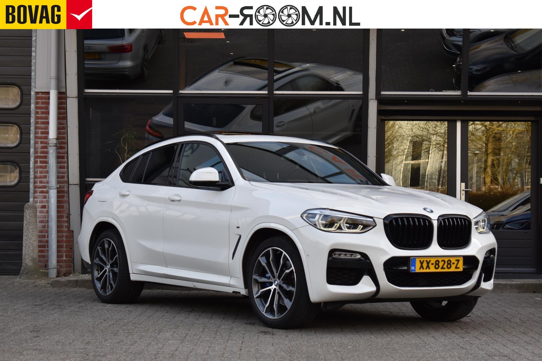 BMW X4 xDrive20i High Executive Edition M-Sport Pano Camera, Automaat, Gebruikt, 4 cilinders, Leder en Stof