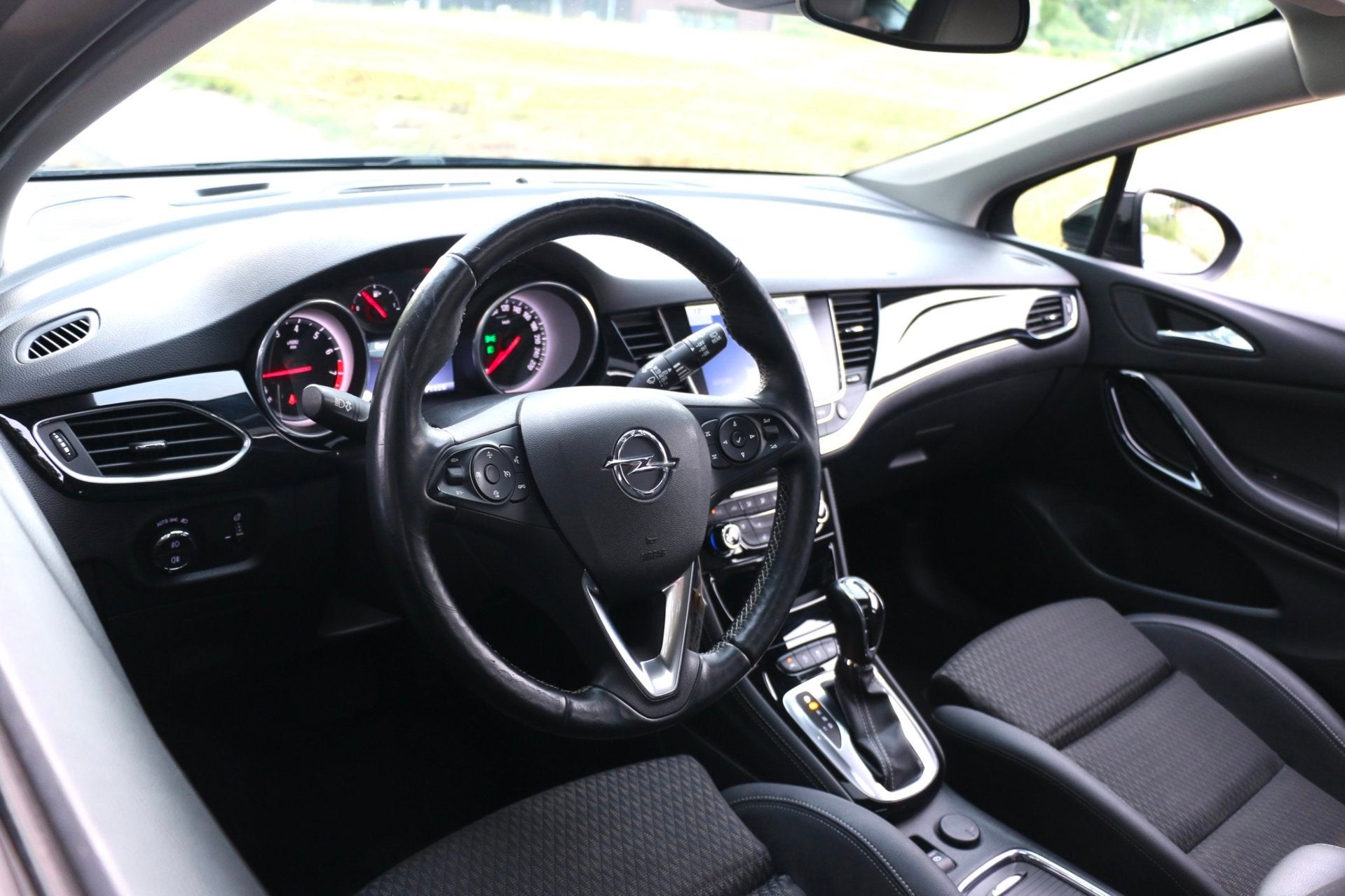 Opel Astra Sports Tourer 1.4 Automaat 150Pk Full Option Aut, Gebruikt, Zwart, Leder, 1240 kg