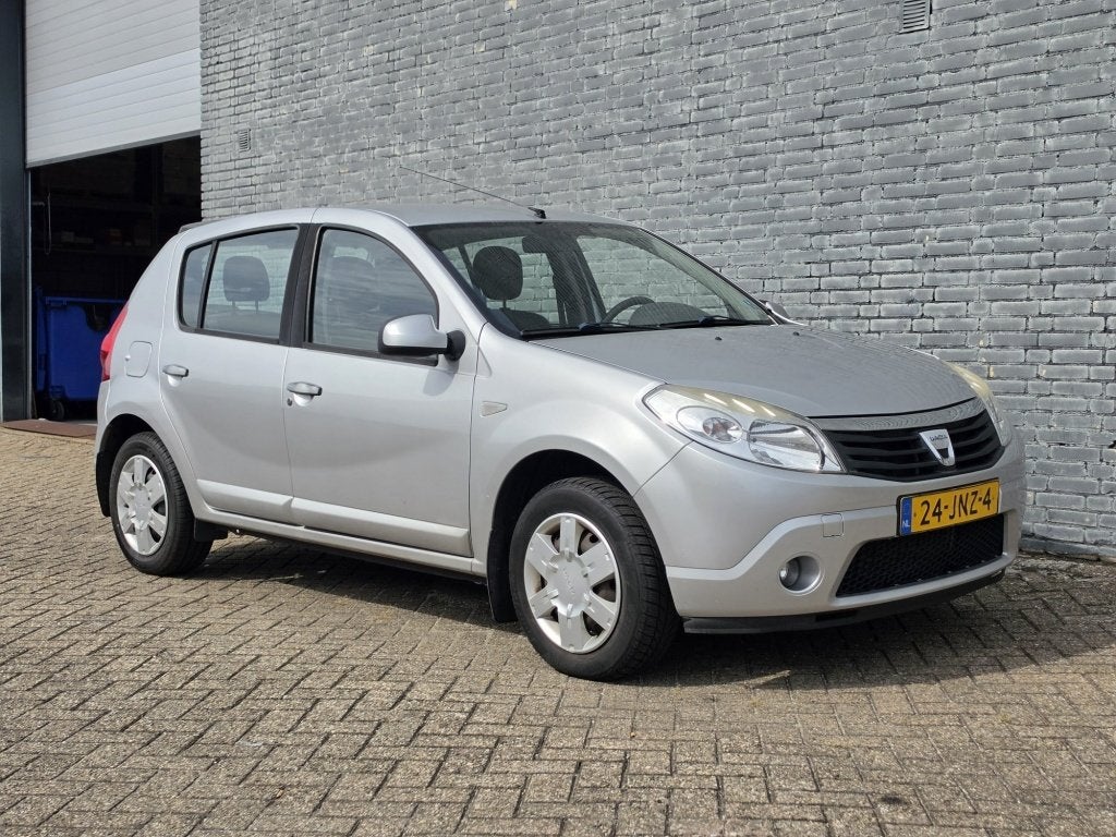 Dacia Sandero 1.2 Lauréate 5Drs Airco Carplay Nw APK ✅, Auto's, Gebruikt, 31 €/maand, Origineel Nederlands, Bedrijf