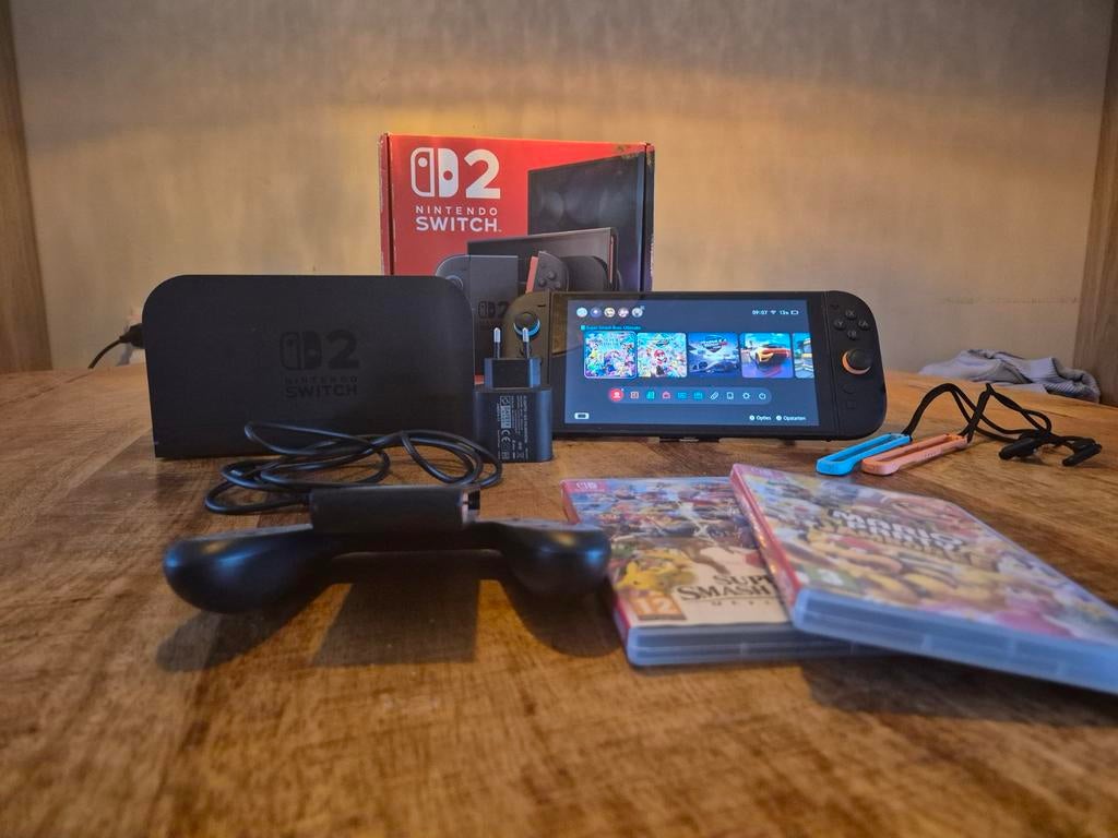 Nintendo Switch 2 met accessoires en games, Spelcomputers en Games, Ophalen, Overige genres, Zo goed als nieuw, Eén computer
