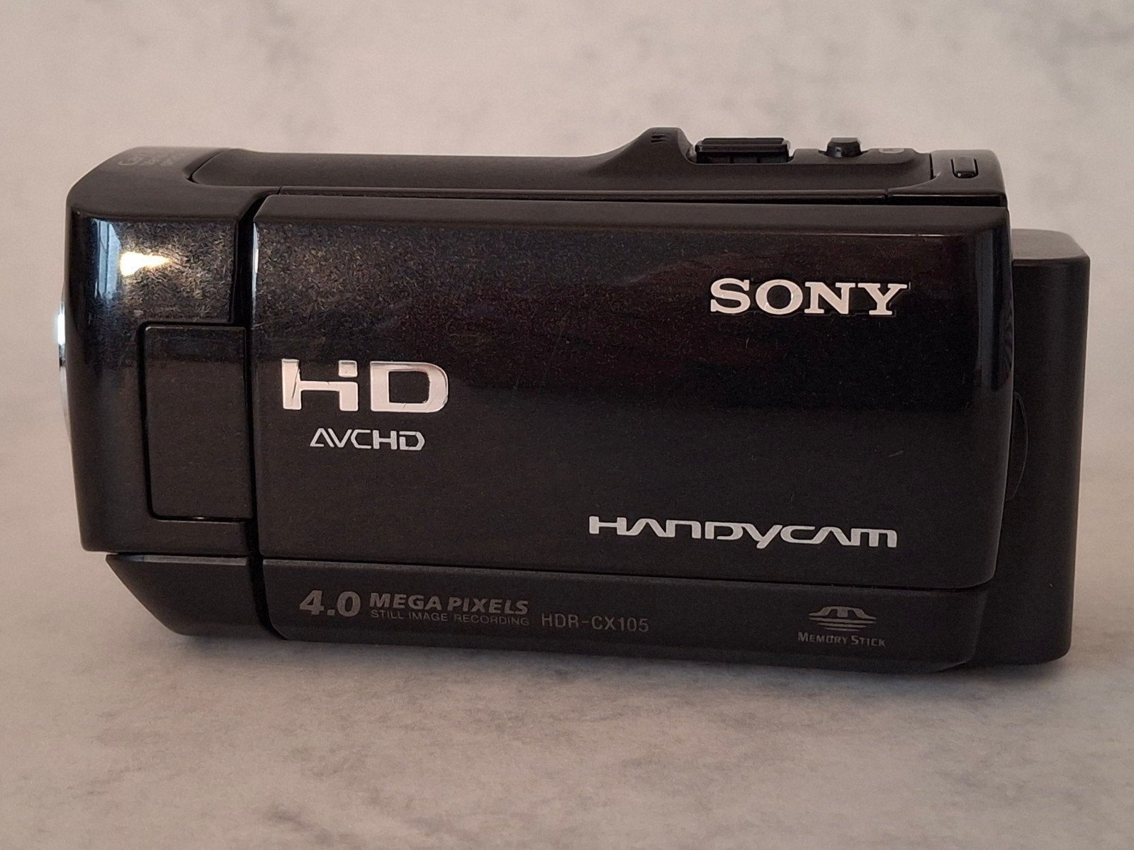 Sony Handycam HDR-CX105E met Marumi M-30S050, Ophalen of Verzenden