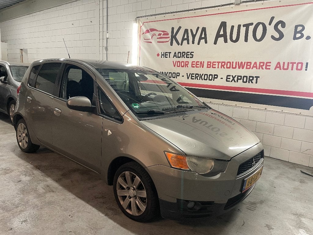 Mitsubishi Colt 1.3 5-DR AIRCO 2010 Grijs, Auto's, Voorwielaandrijving, 31 €/maand, Colt, Origineel Nederlands