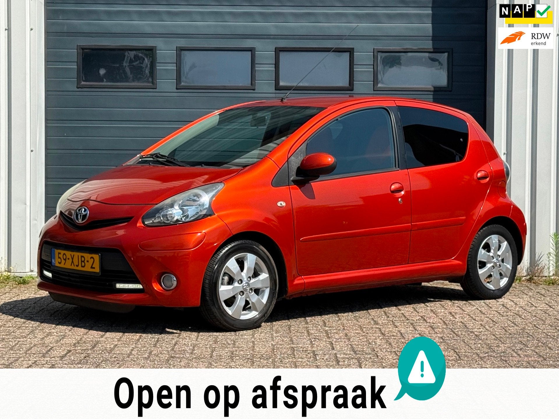 Toyota Aygo 1.0 VVT-i Dynamic Orange 2e EIG/AUTOMAAT/AIRCO, Euro 5, Gebruikt, Overige kleuren, 4 stoelen