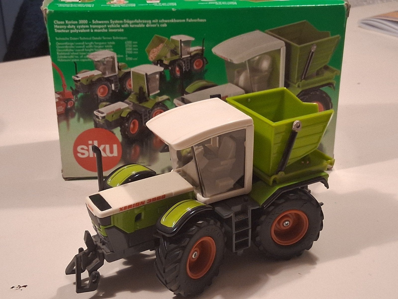 Siku Claas Xerion 3000 met kiepbak, Ophalen of Verzenden, Zo goed als nieuw, Tractor of Landbouw, SIKU