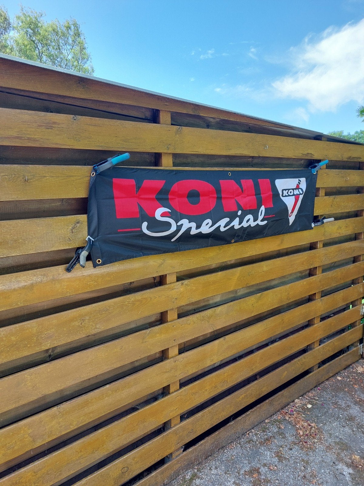 KONI SCHOKBREKERS BANNER 180X45CM, Ophalen of Verzenden