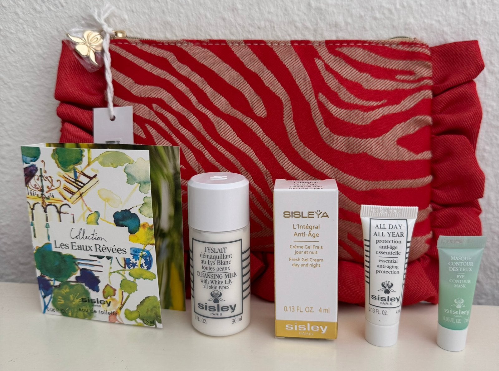 Sisley toilettas nieuw met 5 mini producten, Verzenden, Nieuw, Gehele gezicht, Verzorging