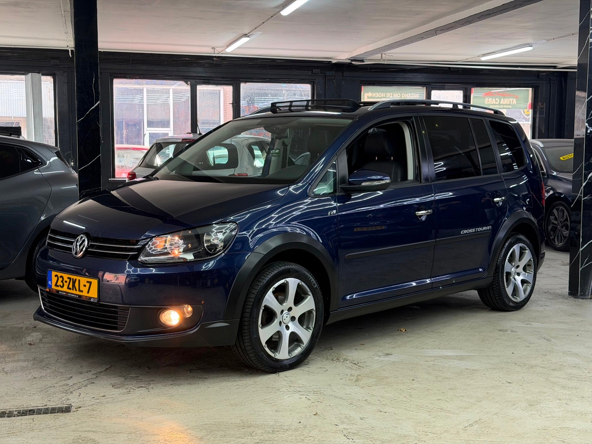 Volkswagen Touran 1.4 TSI Cross Pano | CarPlay | Leer | park, Euro 5, 4 cilinders, Blauw, Automatische klimaatregeling