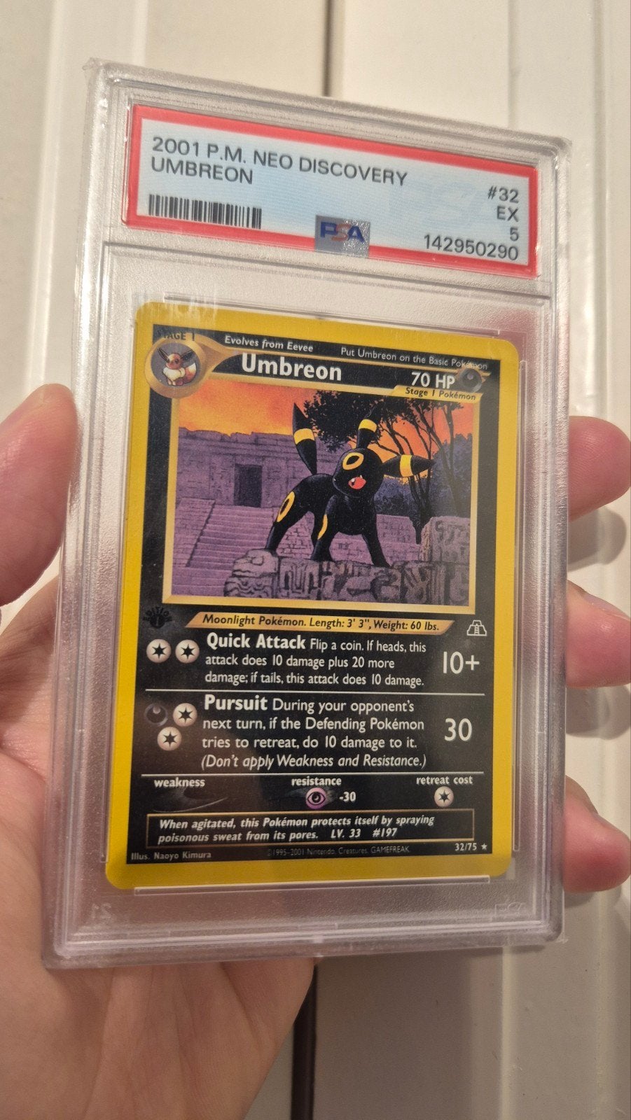 Umbreon 32/75 1st edition ERROR label PSA 5, Ophalen of Verzenden, Gebruikt, Losse kaart