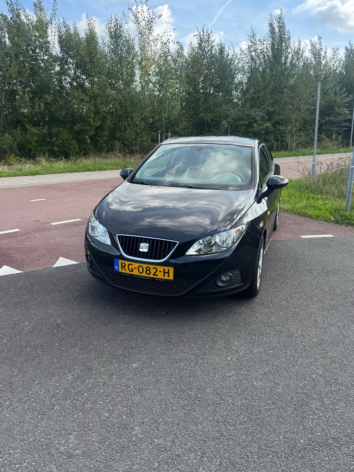 Seat Ibiza 1.4 63KW 2011 Zwart, Auto's, Voorwielaandrijving, Stof, 40 €/maand, 4 cilinders