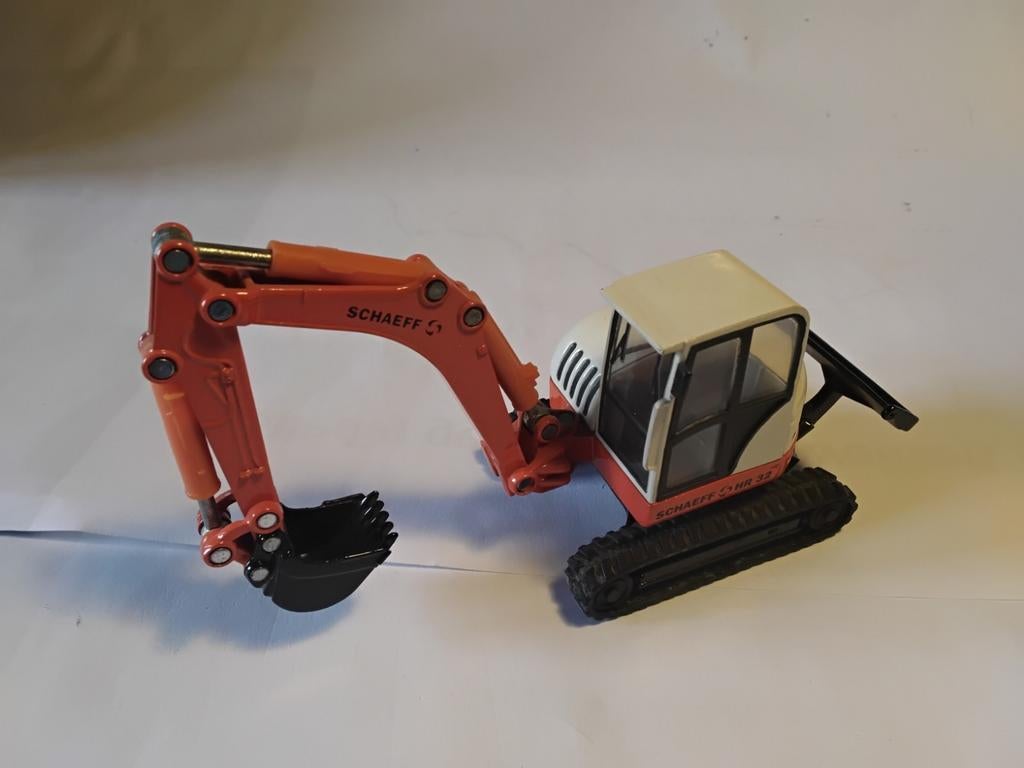 Liebherr kraan en graafmachine van merk Siku 1:87, Ophalen of Verzenden, Gebruikt, Bus of Vrachtwagen, SIKU