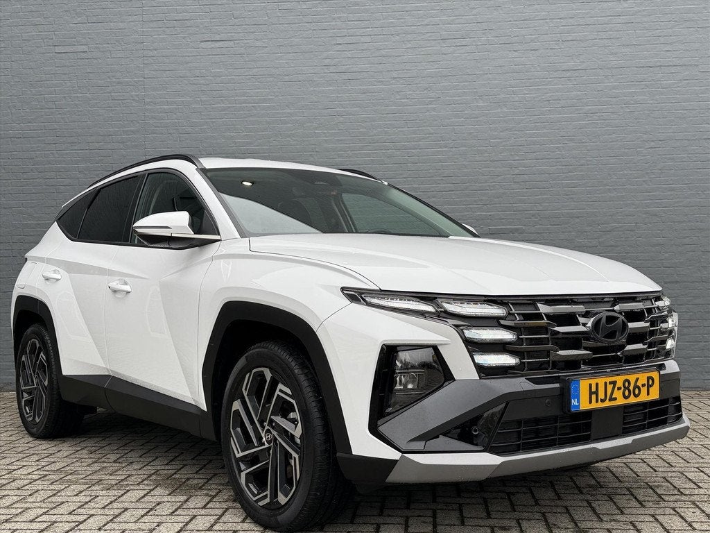 Hyundai Tucson New 1.6 T-GDi PHEV 252pk 2WD Aut Comfort Smar, Auto's, 4 cilinders, Wit, Bedrijf, Hybride Elektrisch/Benzine