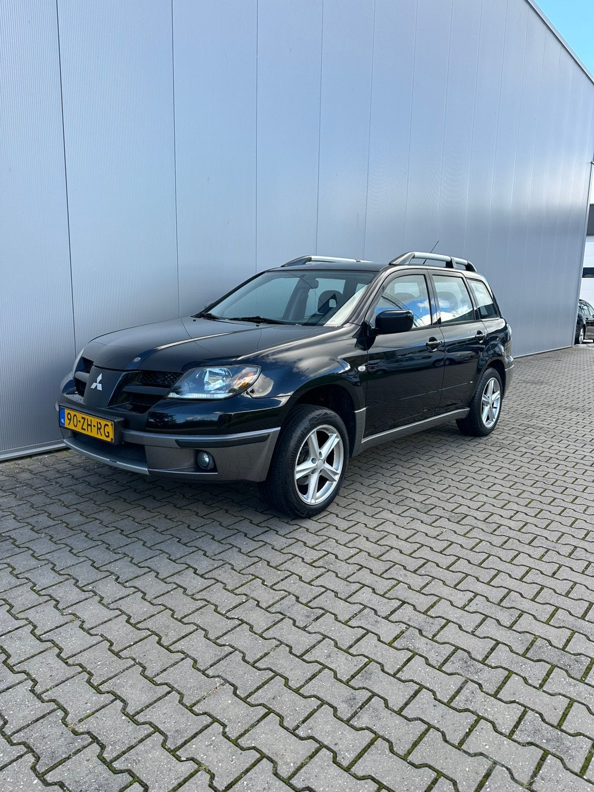 Mitsubishi Outlander 2.0 MPI 4WD 2005 Zwart * km *zeer net, Auto's, 136 pk, Outlander, 4 cilinders, Leder en Stof