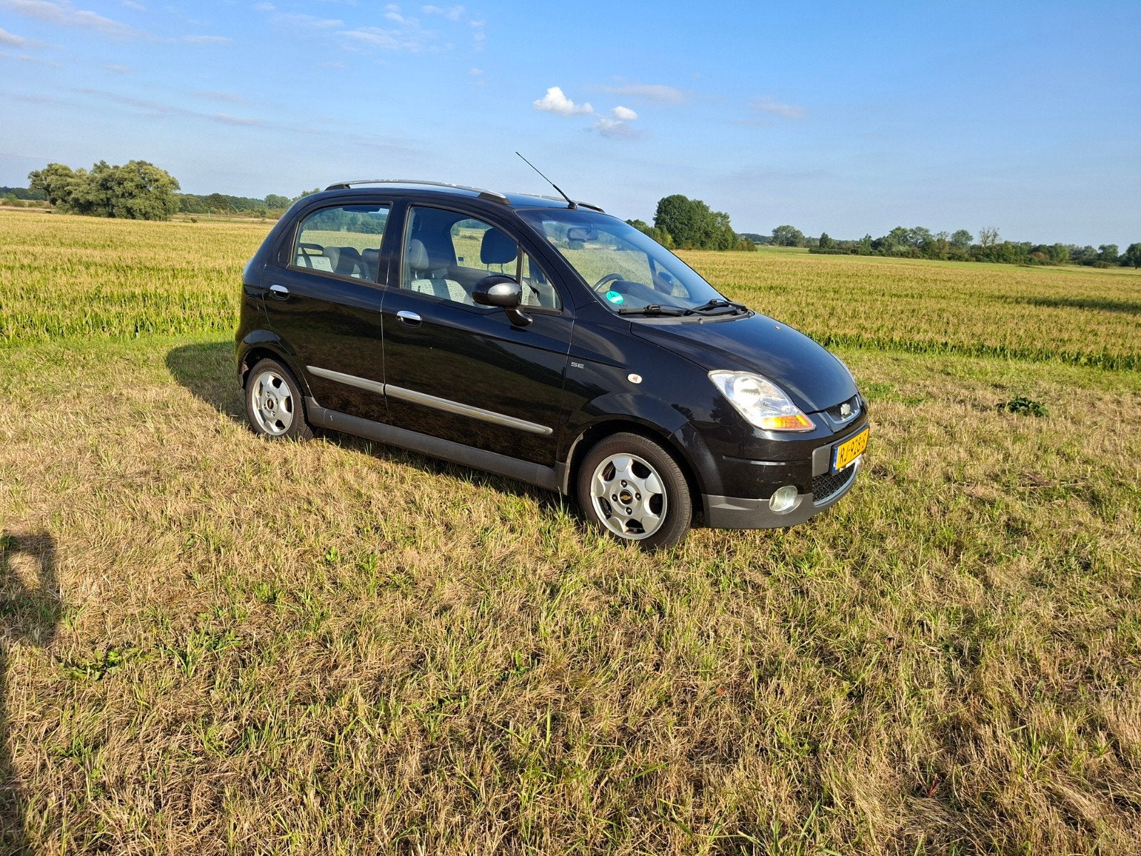 Chevrolet Matiz 1.0 2009 Zwart, Auto's, Voorwielaandrijving, Stof, 600 kg, Zwart