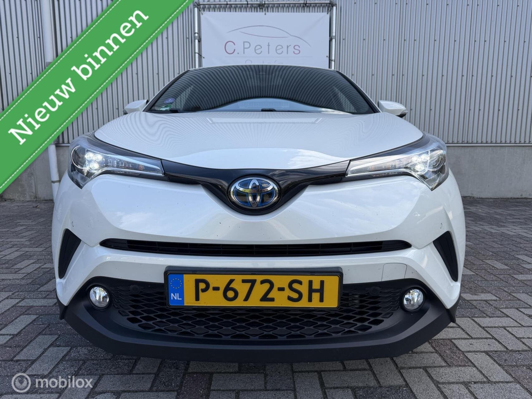 Toyota C-HR 1.8 Hybrid Dynamic 2018 / Camera / Leder / Keyle, Auto's, Dealer onderhouden, Euro 6, 4 cilinders, Leder