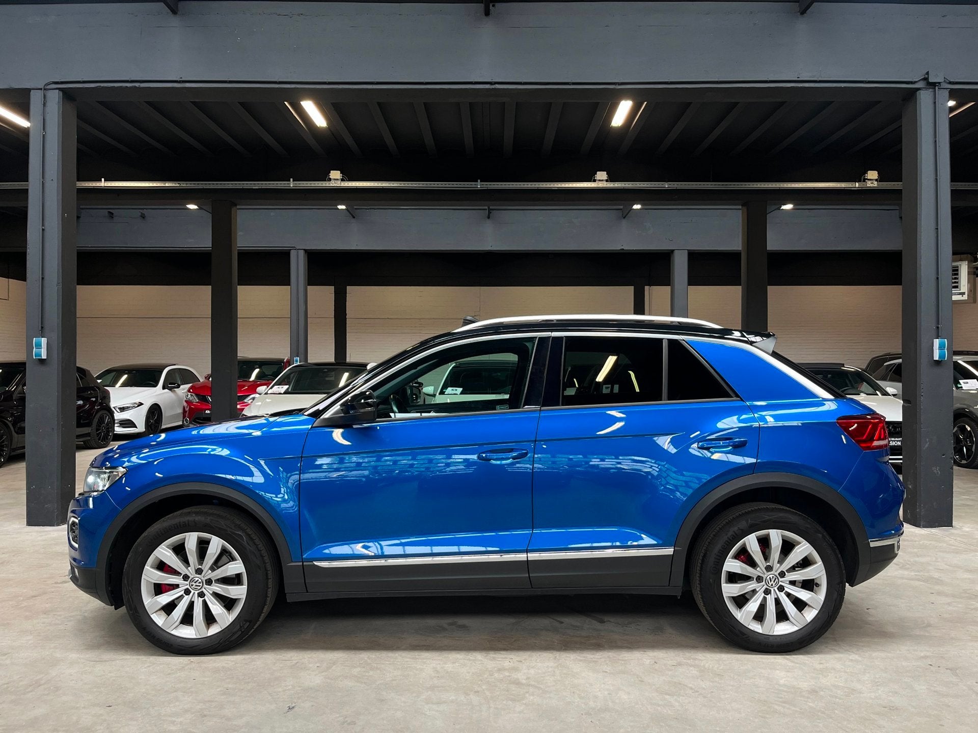Volkswagen T-Roc 1.5 TSI Sport *Pano/Carplay/Stoelverwarming, Auto's, Euro 6, 4 cilinders, 150 pk, Blauw