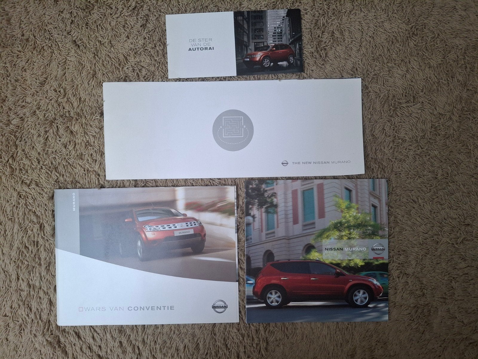 Lot autofolders Nissan Murano, Verzenden, Zo goed als nieuw, Nissan