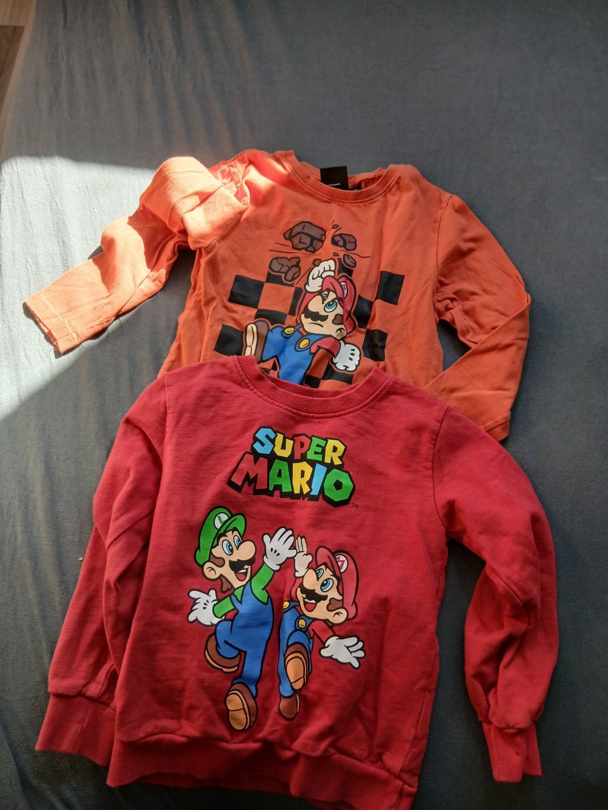 2 Super Mario Longsleeves/Truien - Maat 116 - Goede Staat, Ophalen of Verzenden