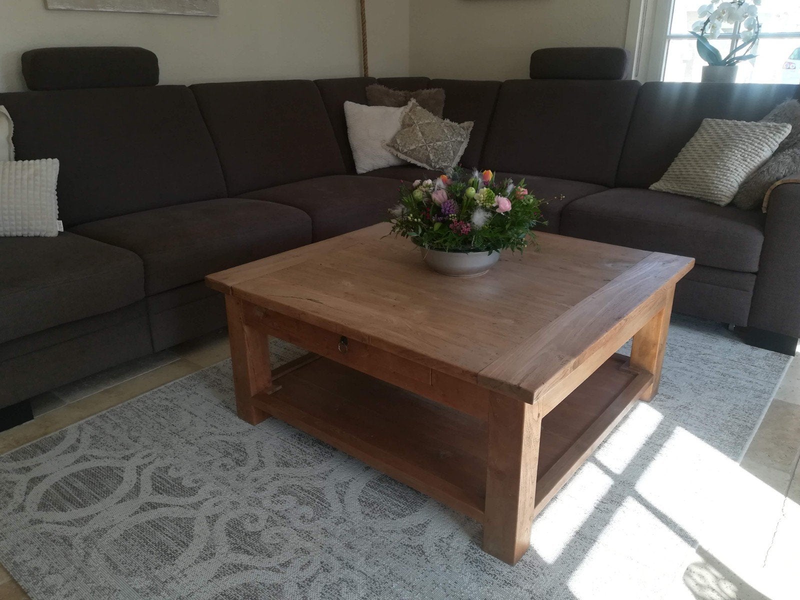 Teakhouten salontafel, Ophalen
