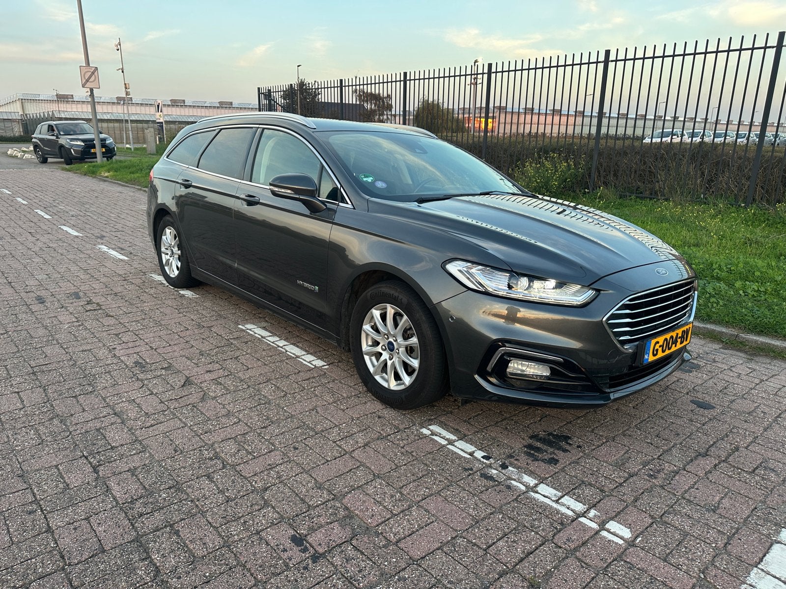 Ford Mondeo 2.0 HEV 187pk Ecvt 2019 Grijs, Auto's, Dealer onderhouden, Stof, 4 cilinders, Mondeo