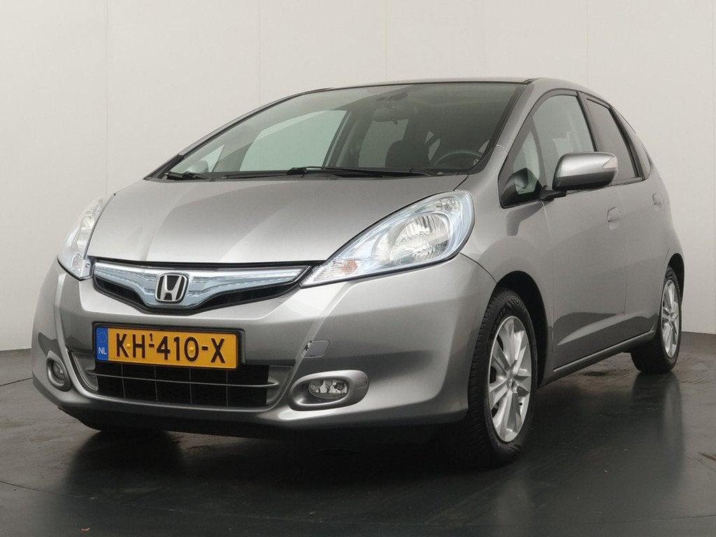 Honda Jazz 1.4 Hybrid Elegance Automaat - Panoramadak - Clim, Auto's, Honda, Euro 5, Gebruikt, Zwart, 4 cilinders