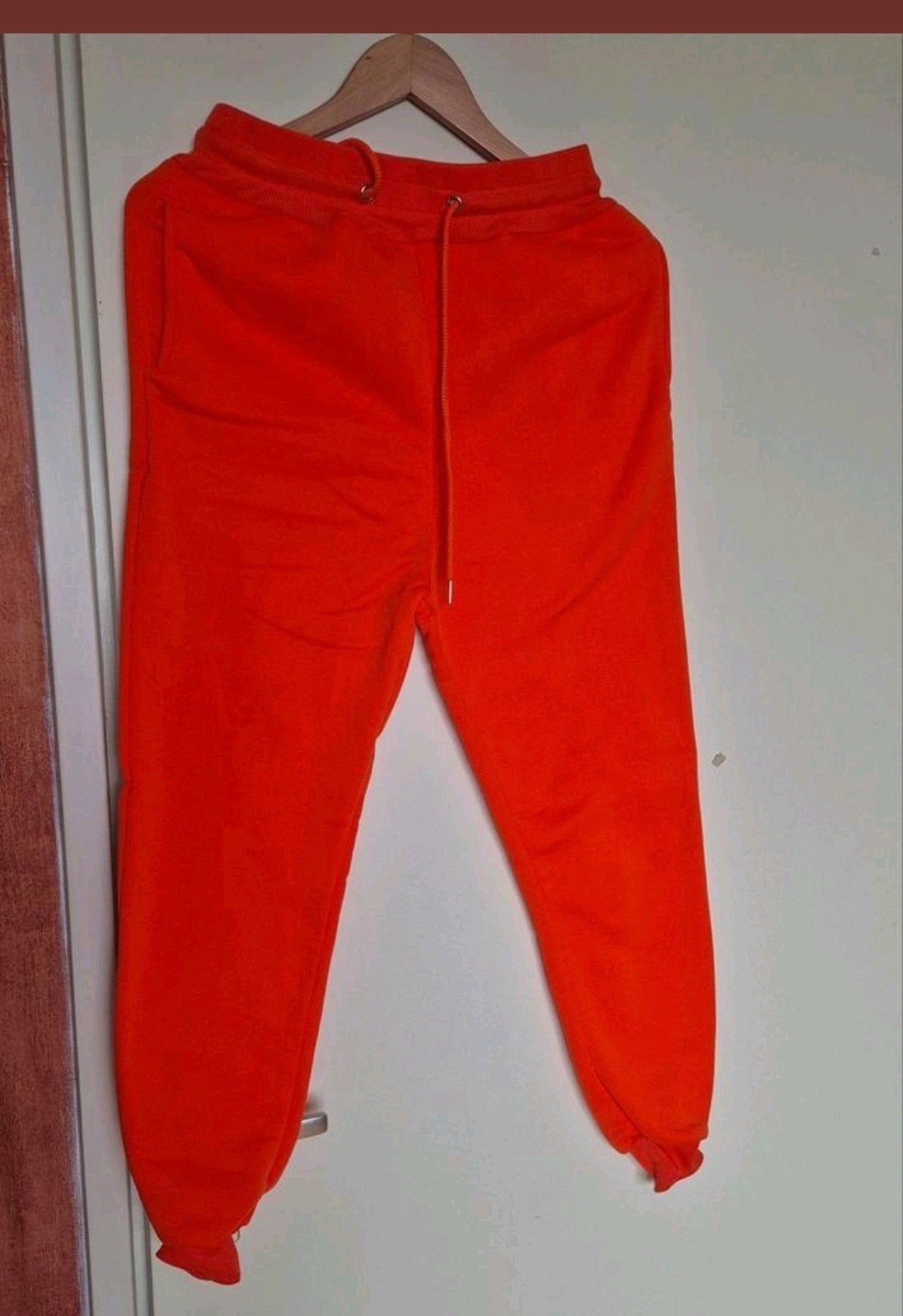 Comfortabele nieuwe oranje joggingbroek maat S unisex, Nieuw, Oranje, Ophalen of Verzenden, Maat 36 (S)