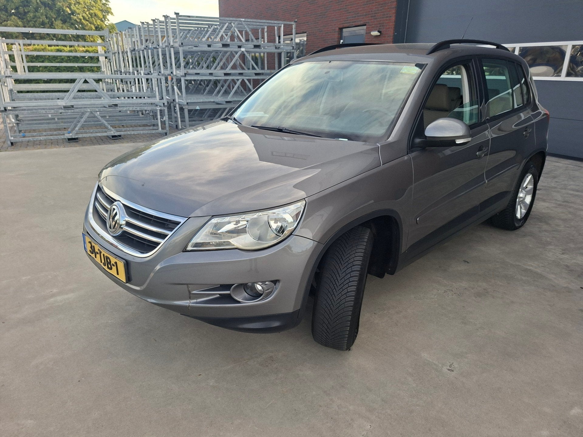 Volkswagen Tiguan 2.0 TSI Sport&Style 4Motion Automaat, Auto's, Automaat, Stof, Gebruikt, 4 cilinders
