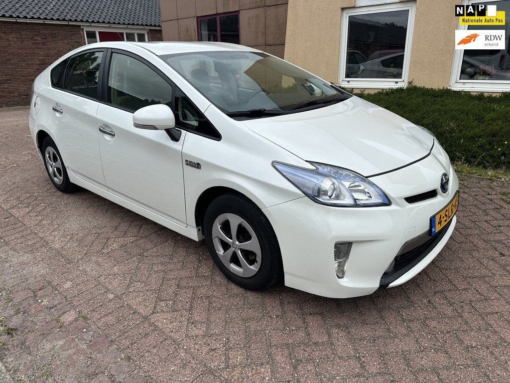 Toyota Prius 1.8 Plug-in Aspiration NAVI CAMERA LEER NAP, Auto's, Toyota, Euro 5, Gebruikt, Wit, Prius