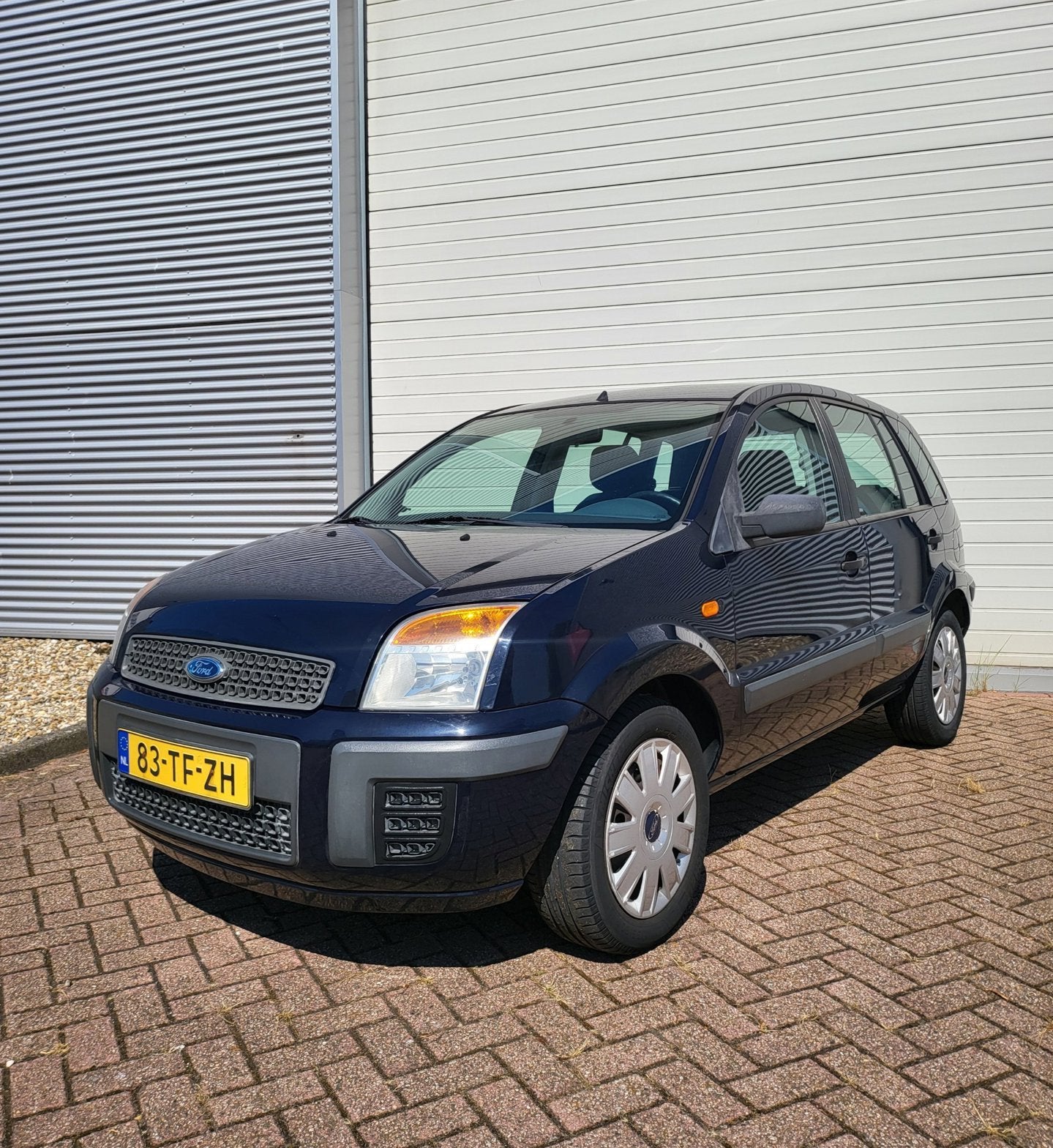 Ford Fusion 1.4-16V Champion Nwe APK Airco, Auto's, Voorwielaandrijving, Gebruikt, Zwart, Blauw