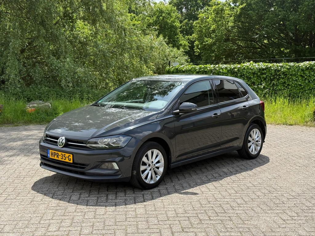 Volkswagen POLO 1.0 TSI High Line BLUETOOTH I PDC I STOELVER, Voorwielaandrijving, Gebruikt, Euro 6, 23 km/l