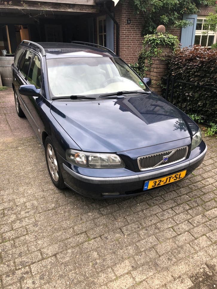 Volvo V70 2.4 140PK 2002 Blauw, Voorwielaandrijving, 1800 kg, Blauw, Leder en Stof