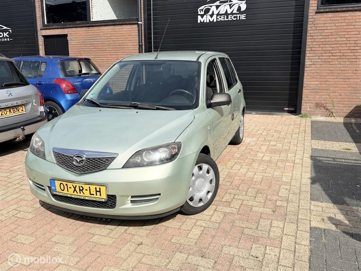 Mazda 2 1.4 Exclusive | NAP | 159.427 km | Airco | Trekhaak, Auto's, Voorwielaandrijving, 1025 kg, 15 km/l, Gebruikt